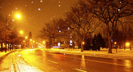 snow in streetlights